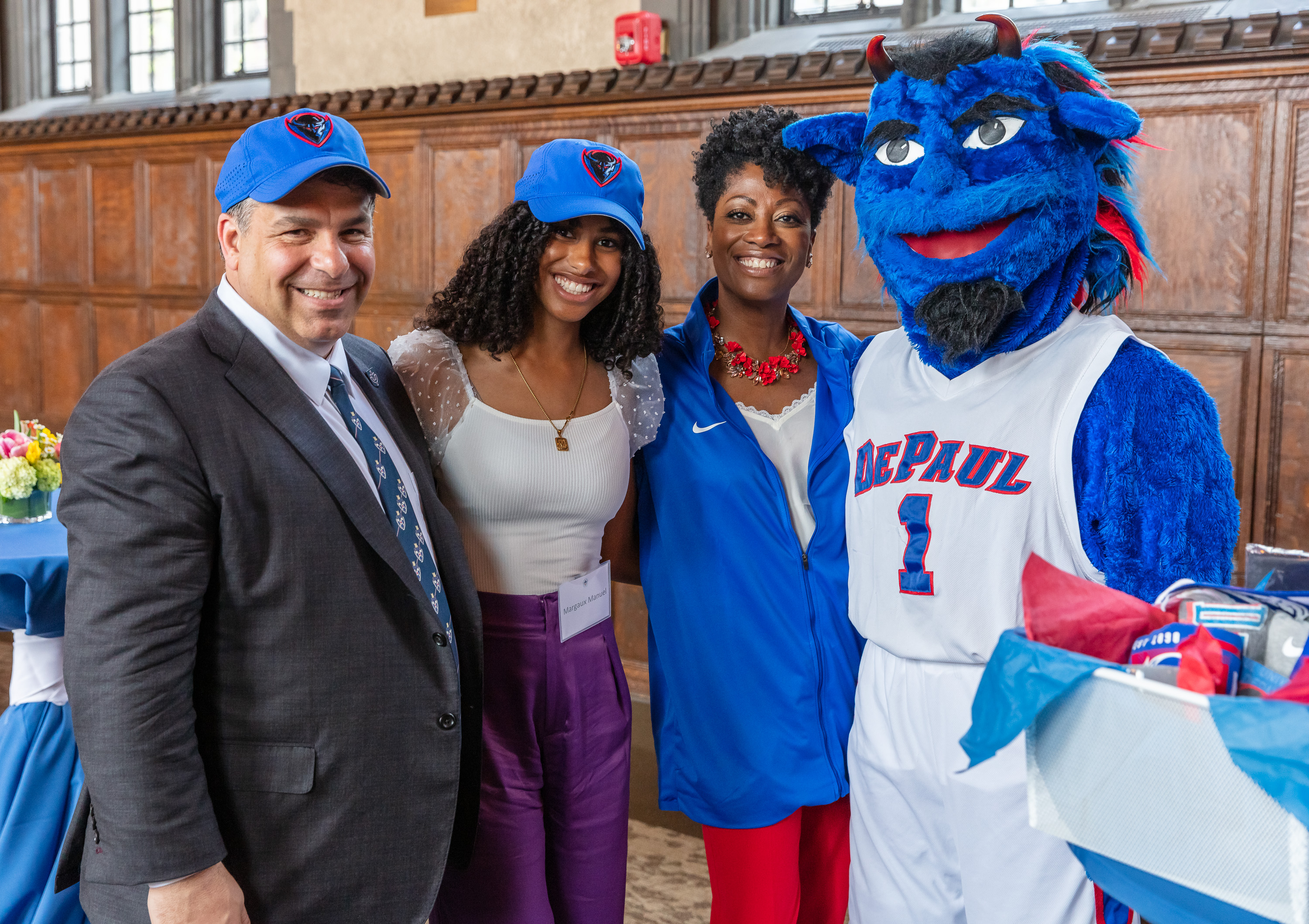 DIBS, DePaul's mascot, stopped by the Lincoln Park Campus to welcome President-elect Robert Manuel and his family to the university community. (DePaul University/Randall Spriggs)